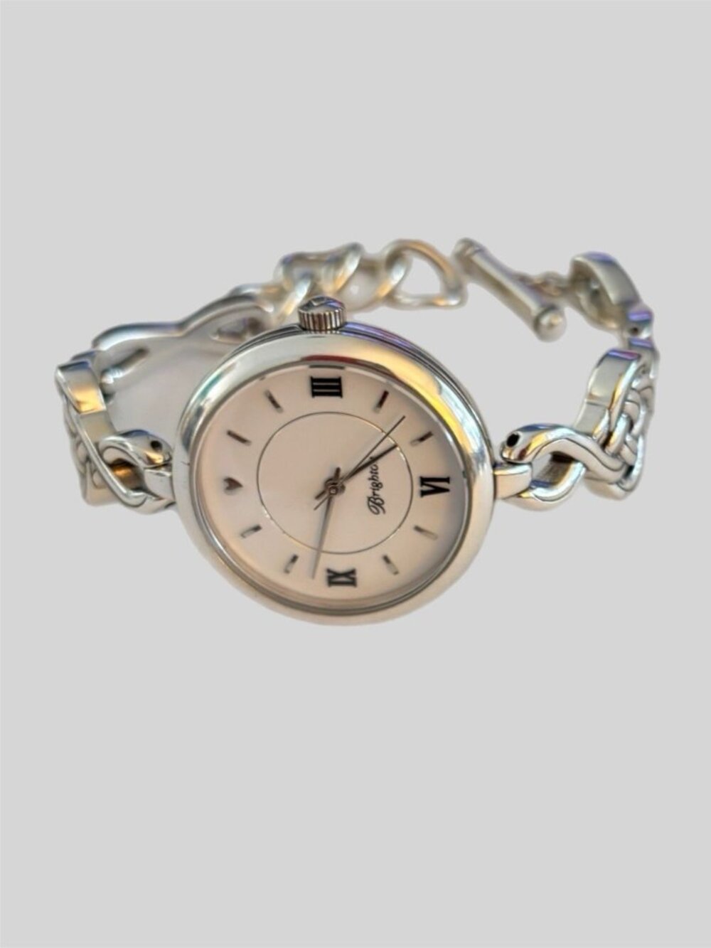 BRIGHTON INTERLOK SILVER WATCH 1 1/4 FACE DIAMETER  NEW BATTERY